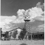 Amache water tower and barracks photo