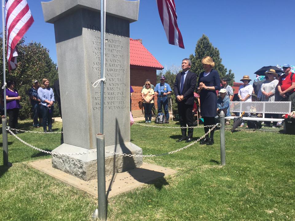 Amache Pilgrimage 2016. Consul General and Wife paying homage to those who were incarcerated and died at Amache. Photo by Amache Preservation Society.