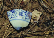 Teapot lid fragment at Amache. Photo courtesy DU Amache Project.