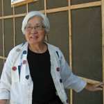 Lily Havey, a long time resident of Salt Lake City, shown outside a reconstructed barrack at Topaz, UT, July 2015. Photo courtesy Lily Havey.