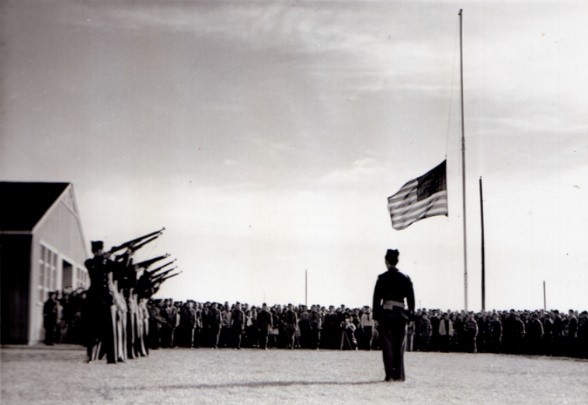 Memorial service with flag at half-staff. APS McClelland collection photo.