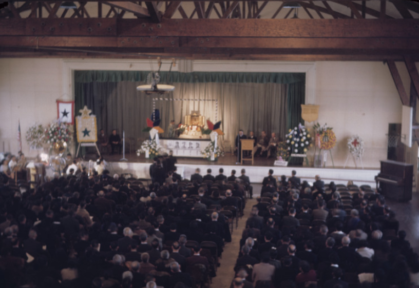 Memorial Service in the Amache gym for six servicemen from Amache. APS McClelland collection photo.